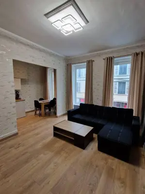Coin salon dans l'établissement Appartement au cœur de la ville
