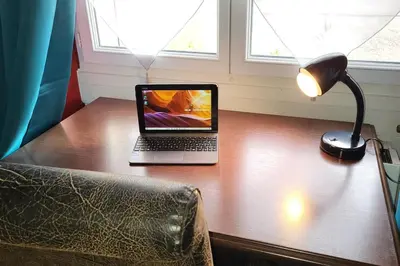 Télévision ou salle de divertissement dans l'établissement Appartement Le Dauphin