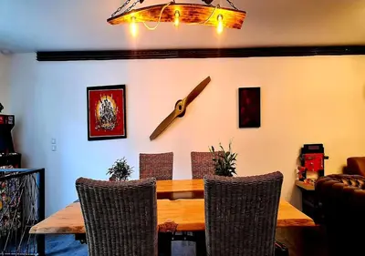 Coin salon dans l'établissement Le 39 Dole Appartement industriel au cœur de Dole