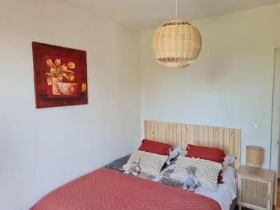 Un ou plusieurs lits dans un hébergement de l'établissement La Maison des 4 moineaux