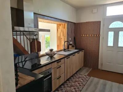 Cuisine ou kitchenette dans l'établissement La Maison des 4 moineaux